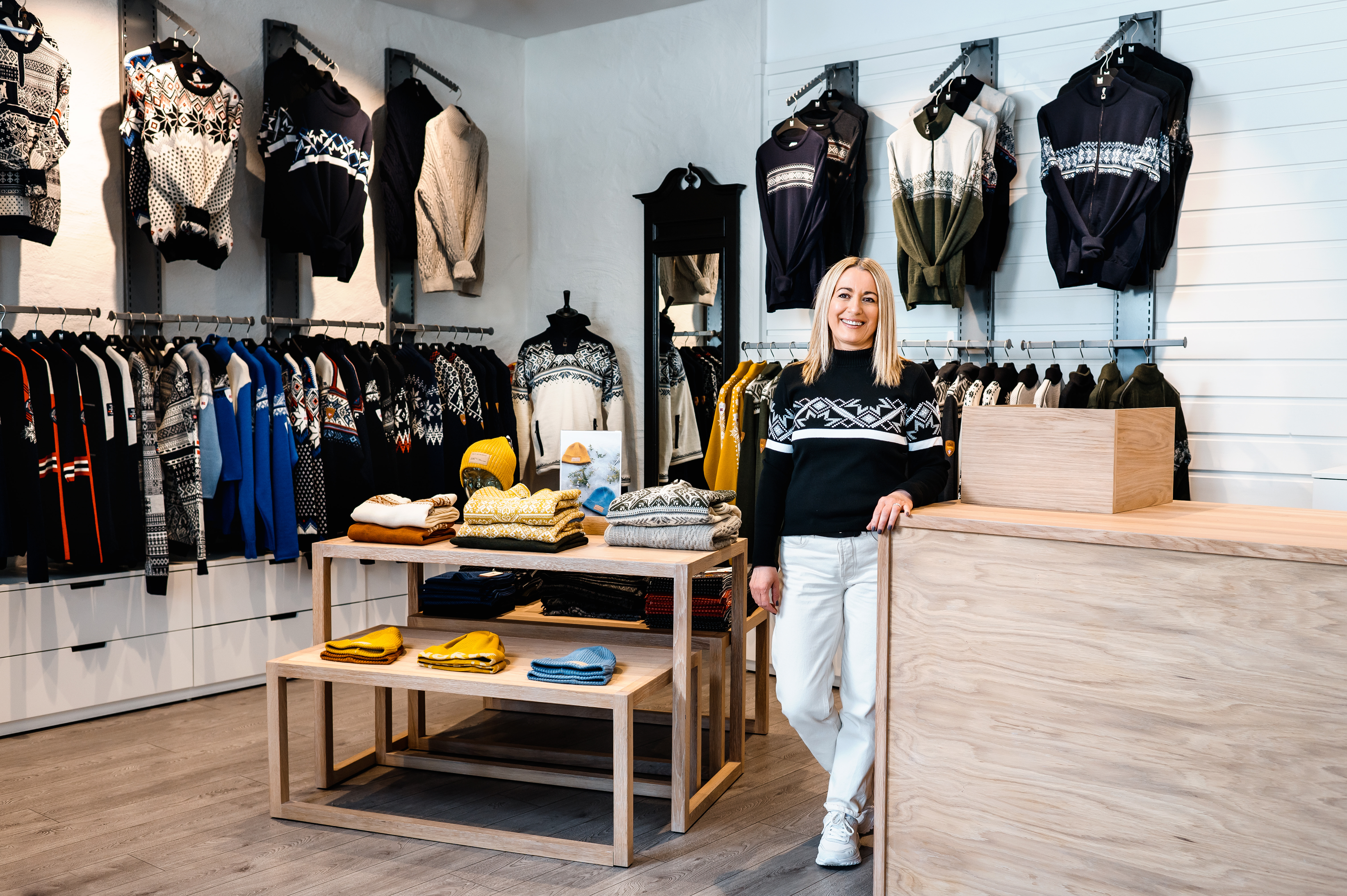 Woman standing by counter in store